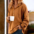 Kapuzenpullover mit Knöpfen