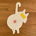 Niedliche gestrickte Kätzchen-Hintern-Untersetzer