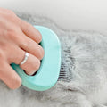 Massierender Muschelkamm zur Haarentfernung bei Katzen