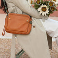 Dreilagige Umhängetasche und Clutch aus Leder