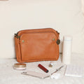 Dreilagige Umhängetasche und Clutch aus Leder
