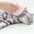 Massierender Muschelkamm zur Haarentfernung bei Katzen