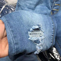Distressed-Jeans mit fünf Knöpfen