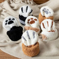 Flauschige flauschige Katzenkrallensocken