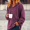 Kapuzenpullover mit Knöpfen