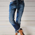 Gewaschene Jeans mit zerrissenem Tunnelzug und elastischem Bund