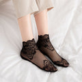 Neue Damenmode-Spitzensocken
