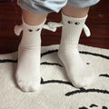 Hand-in-Hand-Socken mit magnetischen Händen