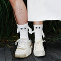 Hand-in-Hand-Socken mit magnetischen Händen