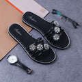 Geblümte Strandsandalen