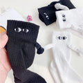 Hand-in-Hand-Socken mit magnetischen Händen