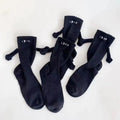Hand-in-Hand-Socken mit magnetischen Händen