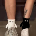 Hand-in-Hand-Socken mit magnetischen Händen