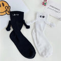 Hand-in-Hand-Socken mit magnetischen Händen