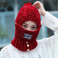 Strickmütze mit Ohrenschützern