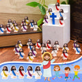 Mini-Jesus-Figuren mit dem Slogan "Jesus liebt dich"
