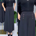 Stilvolle, plissierte Hose mit weitem Bein