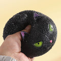 Lustiger, süßer, katzenförmiger Ball