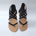 Sommerliche, überkreuzte, flache Sandalen mit Reißverschluss