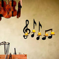 Schwarze Musiknoten-Wandleuchte