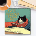 Wandkalender "Katzen chillen mit Büchern" 2026