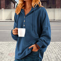 Kapuzenpullover mit Knöpfen