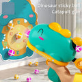 Dinosaurier-Klebeball-Spielzeugpistole