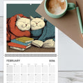 Wandkalender "Katzen chillen mit Büchern" 2026