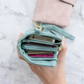 Kleine dreifach faltbare Lederbrieftasche für Damen