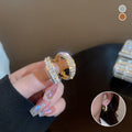 Glitzernde kleine Creolen